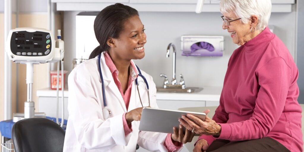 doctor speaking to patient