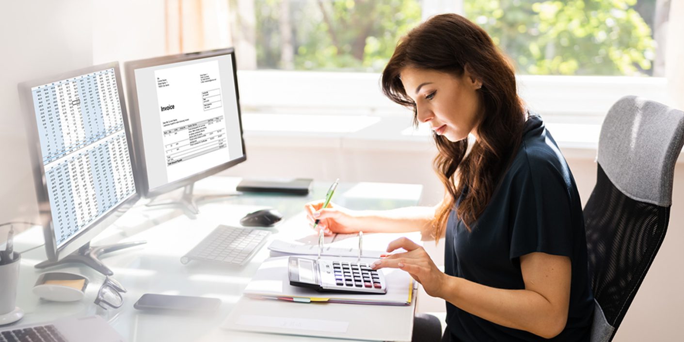 a woman working at her desk