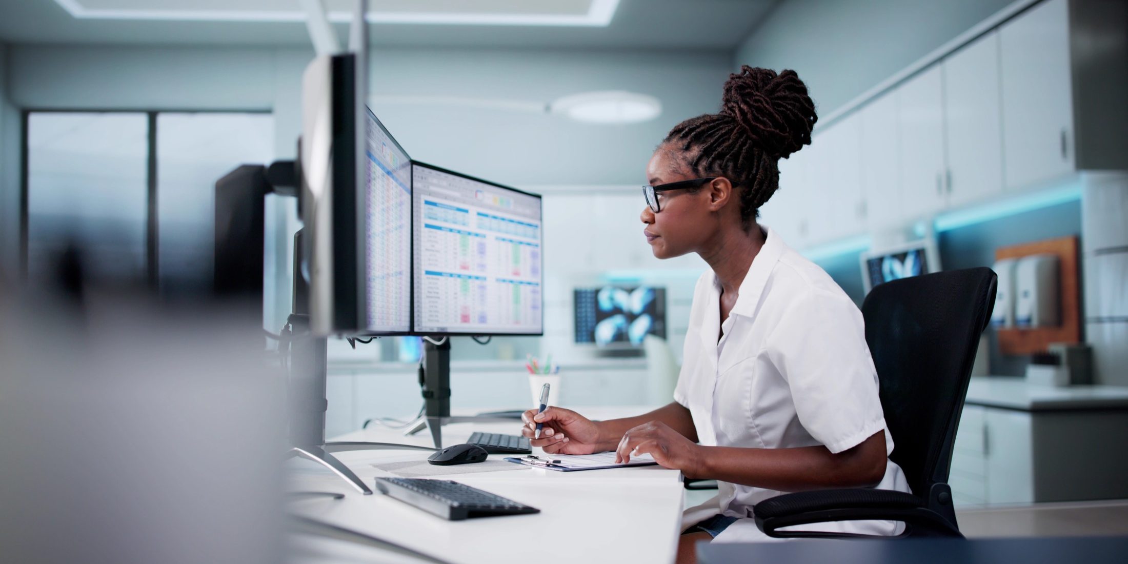 female analyst working on data