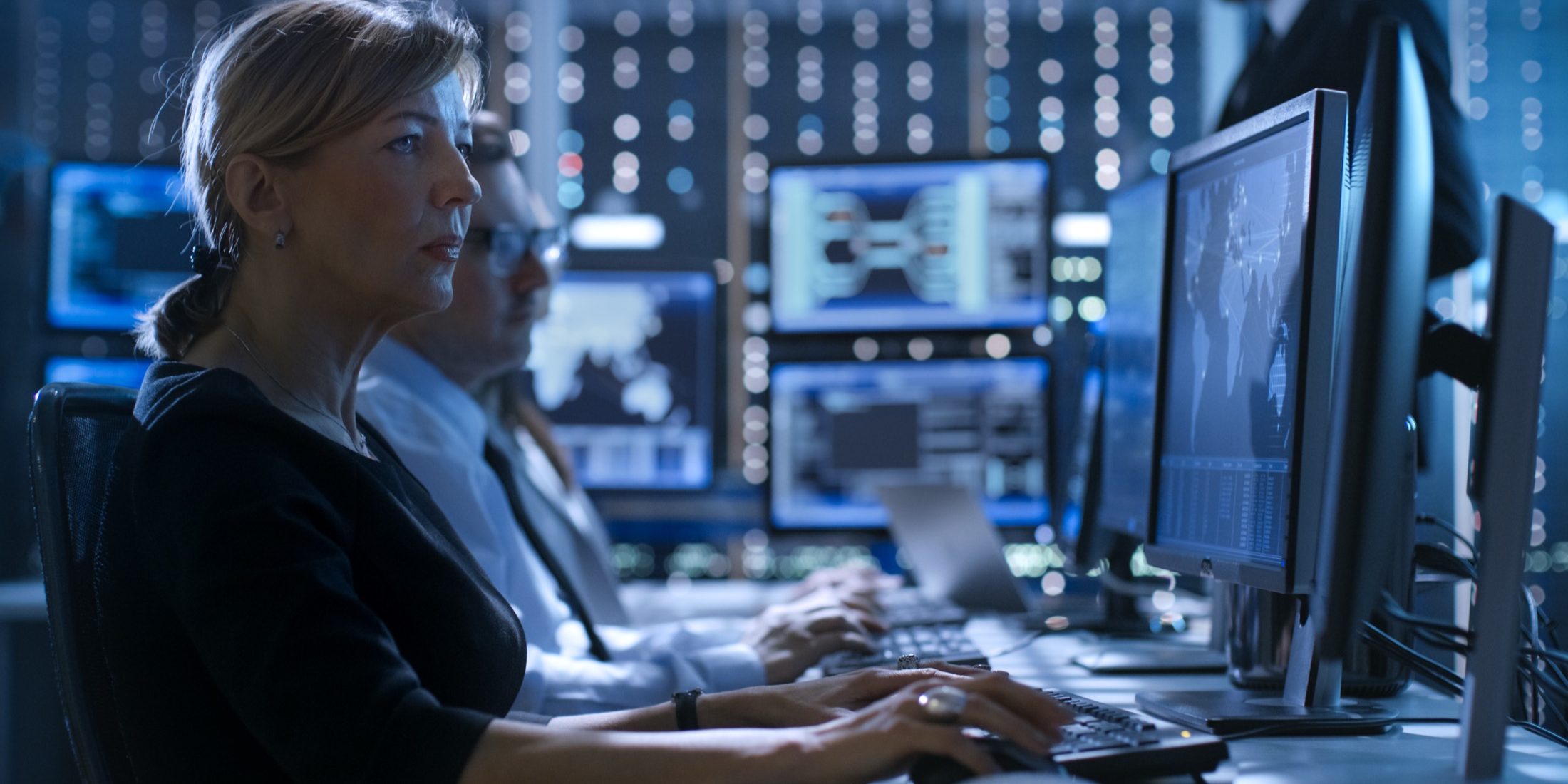 a woman in front of a computer