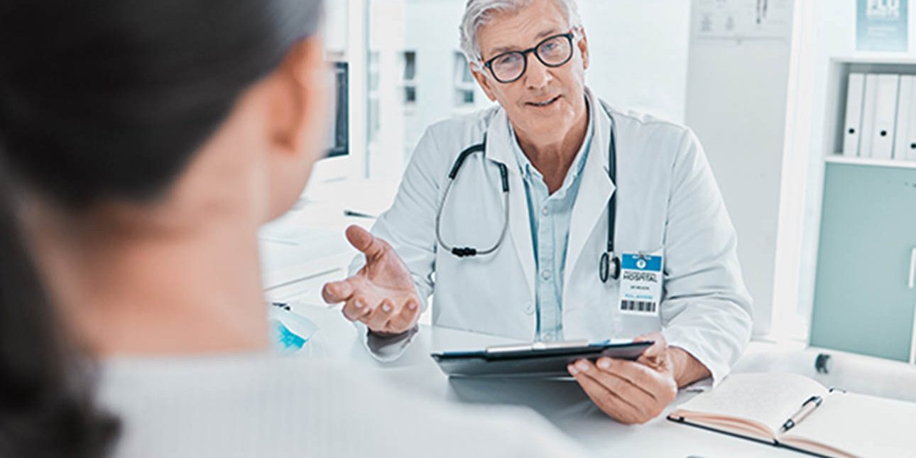 Doctor talking to patient